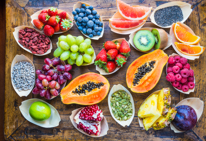 Fruits, berries, nuts, seeds top view.Healthy, detox, superfood.